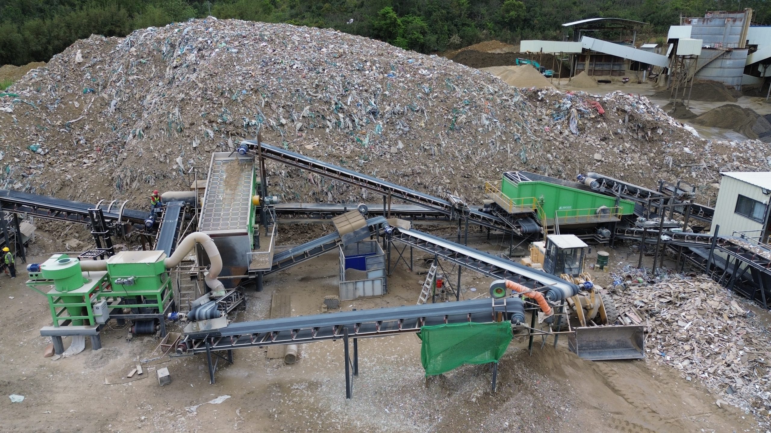 Open bags, classify materials and recover valuable fractions