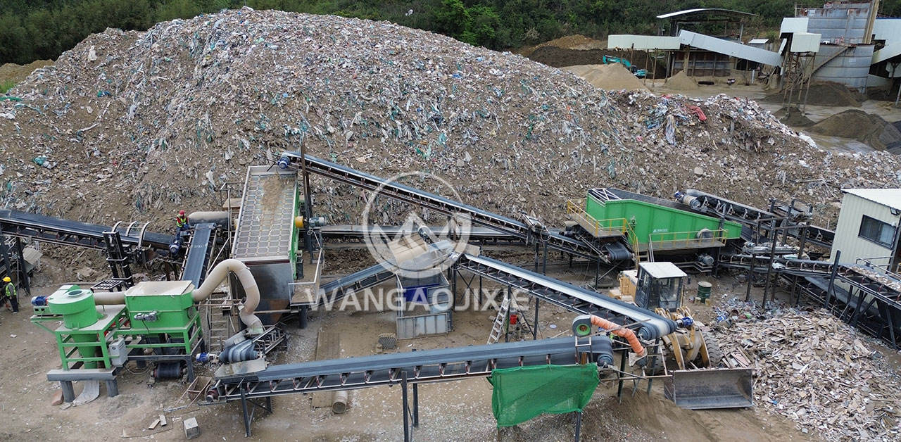 Screen wet landfill material and separate reusable fractions